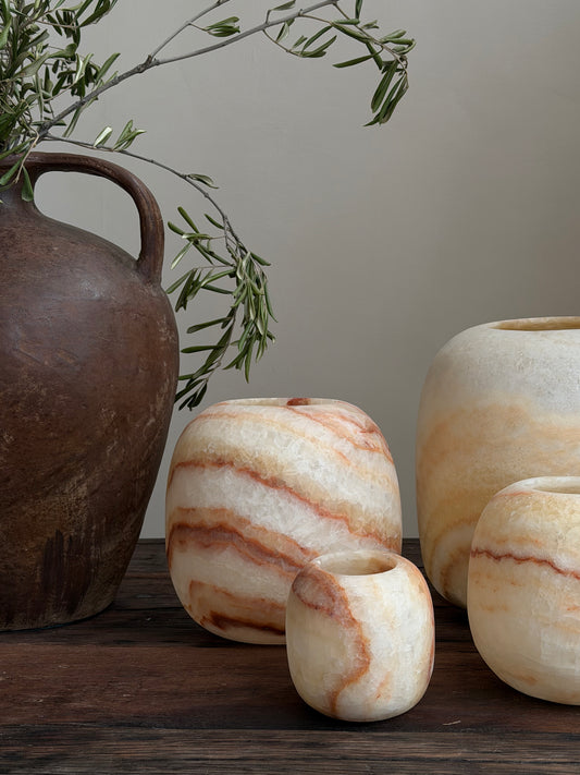 Albasten waxinelichthouder rond bruin