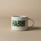 Habibi mok met oor