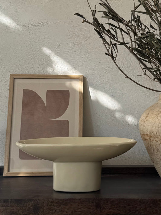 Beige ovale schaal op poot