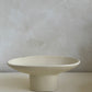 Beige ovale schaal op poot