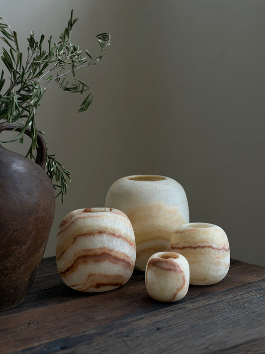 Albasten waxinelichthouder rond bruin